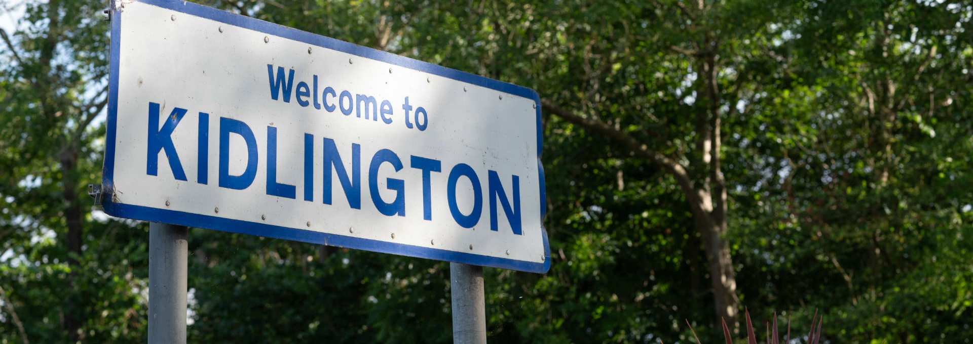 Welcome to Kidlington sign at the entrance to the village, Oxfordshire, UK.
